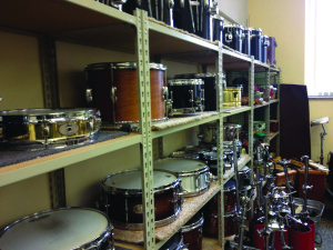 Photo by Andy Hornak | The Duquesne Duke. Instruments are stacked on shelves in a storage room in the Mary Pappert School of Music. According to the new Creative Colleges book by Elaina Loveland, the instruments are being put to good use, as the school ranks in the top 58 in the nation.
