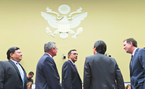 AP Photo. House Oversight Committee Chairman Rep. Darrell Issa, R-Calif. (center) speaks with Obama administration technology officials in Washington on Nov. 13.