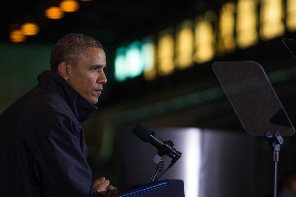 Photo by Aaron Warnick | Photo Editor. President Barack Obama speaks at the Mon Valley Works Irvin Plant in West Mifflin on Wednesday. Despite being indoors, the President and audience alike bundled up for the afternoon as he rehashed his State of the Union address.