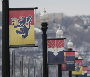 Photo by Aaron Warnick | Photo Editor. Duquesne street banners hang over Bluff Street. DU posted a 97 percent retention rate.