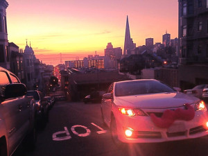 A Lyft car cruises through San Fransisco. The service is now available in Pittsburgh.