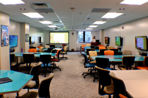 Photo by Taylor Miles | The Duquesne Duke. 442 Fisher Hall, a FlexTech classroom, features collaborative work stations. 
