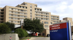 AP Photo. A sign points to the entrance to the emergency room at Texas Health Presbyterian Hospital in Dallas, where Ebola patient Thomas Eric Duncan was being treated. 
