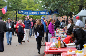 Photo by Rebecca Kittel | For The Duquesne Duke. Students, faculty and alumni explore booths on Academic Walk this weekend as a part of Homecoming festivities. Inclement weather forced Autumnfest to end early. 