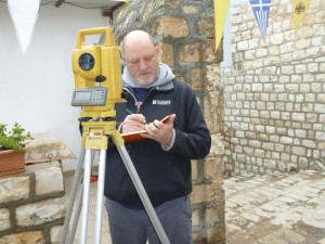 Courtesy Photo. Dean Philip Reeder collects survey data using a Total Station at the Greek Orthodox Bishop of Nazareth’s residence near Mary’s Cave.
