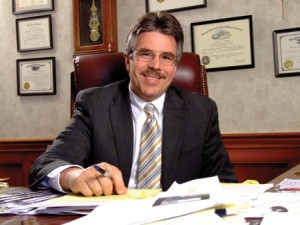 Courtesy Photo. Law school Dean Ken Gormley poses for a photo in his Duquesne office. 