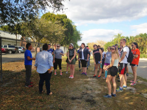 Courtesy Photo. Duquesne students receive a walking tour of farm workers’ housing in Immokalee, Florida over spring break. The service trip has been held since 1988. 