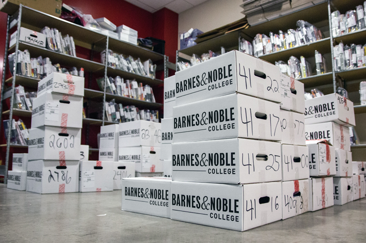 (Claire Murray/Photo Editor) Textbook orders await their student recipients in the basement of the Barnes and Noble bookstore on Forbes Avenue. 