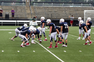 Members of the Duquesne Dukes football team line up for a practice drill Tuesday on Rooney Field. The Dukes begin their 2015 campaign Sept. 5 when they take on Kentucky Christian University at home. 
