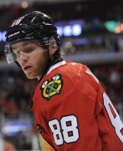 Chicago Blackhawks right wing Patrick Kane (88) warms up before a pre-season NHL hockey game against the Detroit Red Wings in Chicago, Tuesday, Sept. 22, 2015.  (AP Photo/David Banks)