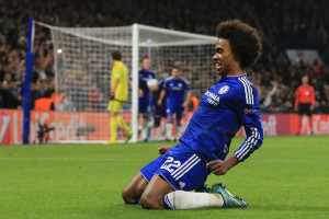 Chelsea's Willian celebrates after scoring the winning goal during the Champions League Group G soccer match between Chelsea and Dynamo Kiev at Stamford Bridge Stadium in London,  Wednesday, Nov. 4, 2015. (AP Photo/Tim Ireland)