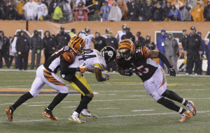 AP Photo - Cincinnati Bengals' Vontaze Burfict (55) runs into Pittsburgh Steelers' Antonio Brown (84) during the second half of an NFL wild-card playoff football game Sunday, Jan. 10, 2016, in Cincinnati. Pittsburgh won 18-16. Burfict was called for a penalty on the play. (AP Photo/John Minchillo)