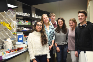 Courtesy of Allyson O'Donnell Duquesne biology professor Allyson O’Donnell (second from the left) poses for a picture with her high school and college research assistants. O’Donnell recently received a grant that will allow her to continue to her research into protein structure.