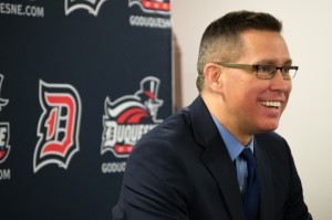 Duquesne Women's Basketball head coach Dan Burt has a laugh with the media after the Dukes' 73-59 victory over the St. Joseph's Hawks. | Joseph Guzy