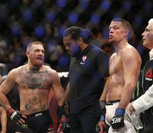 AP Photo - Nate Diaz is declared the winner by referee Herb Dean after his second round submission victory over Conor McGregor during their UFC 196 welterweight mixed martial arts match, Saturday, March 5, 2016, in Las Vegas.