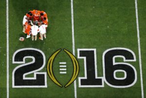 FILE - In this Jan. 11, 2016, file photo, Clemson players huddle before the NCAA college football playoff championship game against Alabama, in Glendale, Ariz. Alabama is No. 1 in The Associated Press preseason Top 25. Clemson is No. 2. (AP Photo/Ross D. Franklin, File)