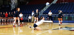 Senior libero Sammy Kline goes down for a dig in the Dukes straight set victory over Coppin State in the Duquesne/Robert Morris Invitational. In the match, Kline recorded the 1,000th dig of her career.