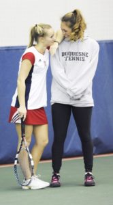 Courtesy of Duquesne Athletics Director of tennis Vanessa Steiner hangs out with junior Maddy Adams. 