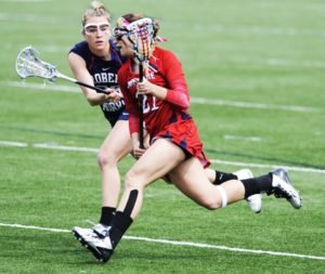 Courtesy of Duquesne Athletics Caitlin Prince goes toward goal in her senior season against Robert Morris. Just over two years later, Prince is back on the Bluff for a second stint — this time as the assistant coach under Evans.