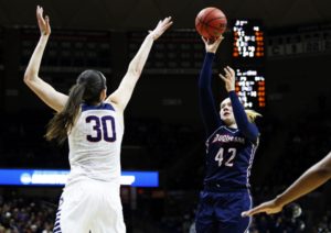 Courtesy of Duquesne Athletics Kadri-Ann Lass shoots over Breanna Stewart in the second round of the 2016 NCAA Tournament.