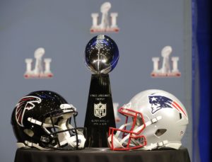 The Vince Lombardi Trophy is seen before NFL Commissioner Roger Goodell's news conference during preparations for the NFL Super Bowl 51 football game Wednesday, Feb. 1, 2017, in Houston. (AP Photo/David J. Phillip)