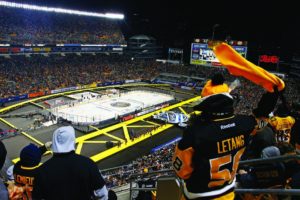 The Pittsburgh Penguins are introduced before an NHL Stadium Series hockey game at Heinz Field against the Philadelphia Flyers in Pittsburgh, Saturday, Feb. 25, 2017. (AP Photo/Gene J. Puskar)