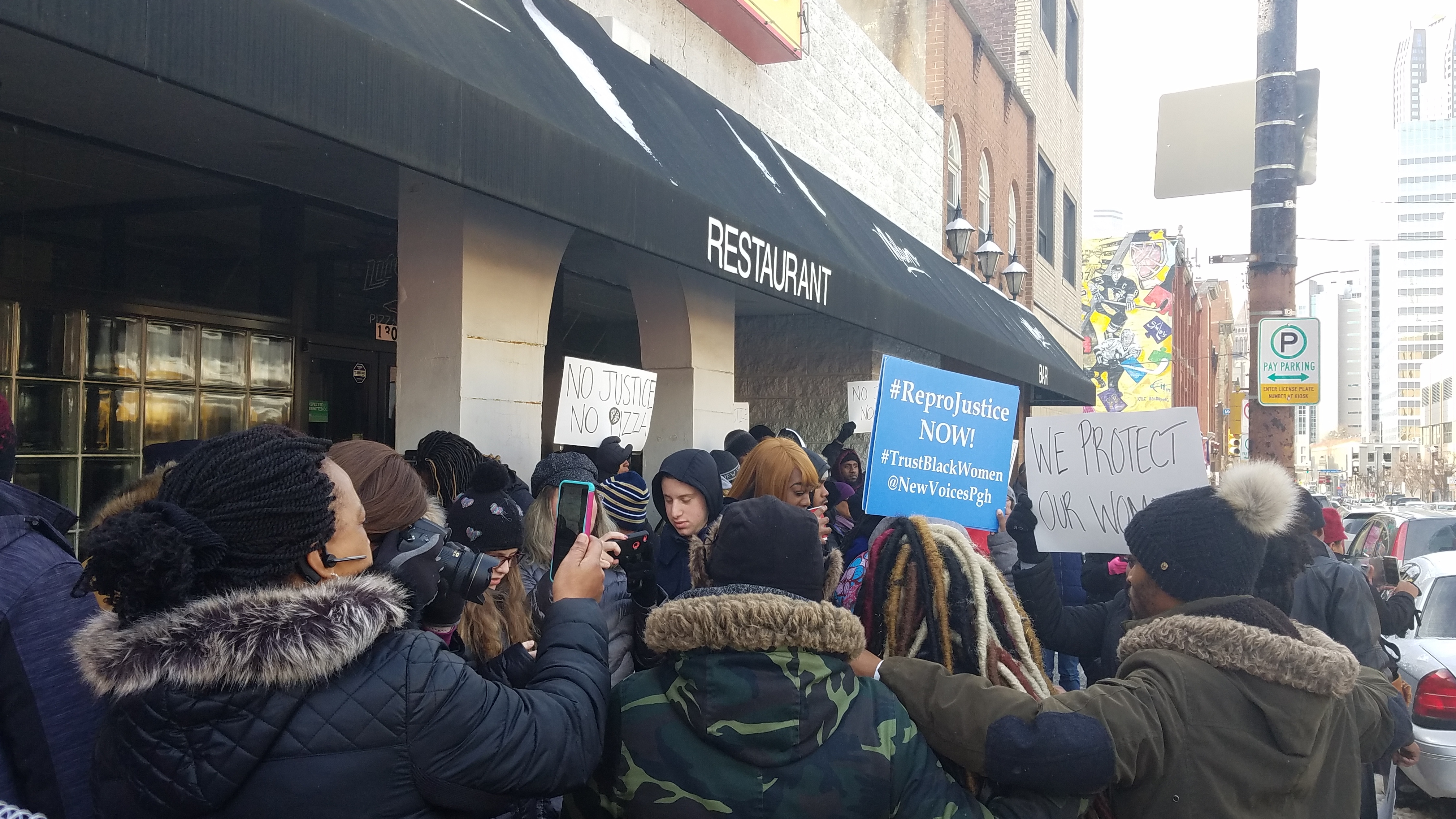 Protest outside of Pizza Milano