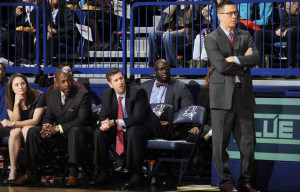 Courtesy of AD - Dan Burt and the rest of his staff look on during one of their matchups last season. Burt hopes to coach his squad to its eighth straight winning campaign. 