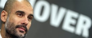 FILE - In this Dec. 19, 2015 file picture Munich head coach Pep Guardiola, attends a news conference after the German Bundesliga soccer match between Hannover 96 and FC Bayern Munich in Hannover, Germany. Manchester City say Pep Guardiola will join the club as its manager on a three-year contract starting next season. Guardiola will replace Manuel Pellegrini, who announced at a news conference on Monday Feb. 1, 2016, that he would be leaving at the end of the season.