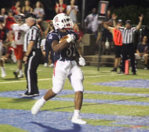 Freshman running back A.J. Hines strolls into the endzone for one of his three touchdowns in the Dukes 30-19 win over Bucknell last Saturday.